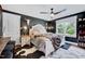 Bedroom features a cowhide rug and dark walls at 39 Westover Ct, Sanford, NC 27332