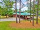 Community center with brick facade and outdoor seating area, perfect for gatherings at 39 Westover Ct, Sanford, NC 27332