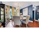 Elegant dining room featuring a chandelier and a stylish display cabinet and Hardwood floors at 39 Westover Ct, Sanford, NC 27332