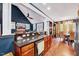Spacious kitchen featuring an open layout with granite countertops and wood flooring at 39 Westover Ct, Sanford, NC 27332