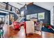 Open-concept living room features high ceilings, staircase access, and hardwood floors at 39 Westover Ct, Sanford, NC 27332