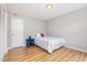 Bedroom with hardwood floors, closet, and neutral walls is perfect for customization and comfort at 404 Sw Maynard Rd, Cary, NC 27511