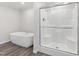 Clean bathroom with soaking tub and glass shower at 41 Andrea Ct, Sanford, NC 27332