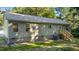 View of the back of the home featuring a wooden stairway and siding at 41 Andrea Ct, Sanford, NC 27332