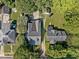 Stunning aerial view showcasing the property's layout, surrounded by lush greenery and well-maintained landscape at 412 Coggeshall St, Oxford, NC 27565
