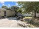 Spacious backyard with a concrete patio and outdoor seating, perfect for entertaining at 412 Coggeshall St, Oxford, NC 27565