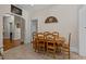 Cozy dining area adjacent to the kitchen with hardwood floors and natural light at 412 Coggeshall St, Oxford, NC 27565