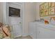 Functional laundry room featuring a modern washer and dryer, with ample space and stylish decor at 412 Coggeshall St, Oxford, NC 27565