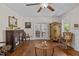 Spacious living room with hardwood floors, elegant furniture, and French doors at 412 Coggeshall St, Oxford, NC 27565