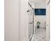 Modern bathroom featuring a glass-enclosed shower, tub, and stylish tile flooring at 4151 Deep Wood Cir, Durham, NC 27707