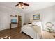 Charming bedroom showcasing wood flooring and natural lighting, exuding comfort and style at 4151 Deep Wood Cir, Durham, NC 27707