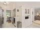 Bright butler's pantry with stainless steel appliances and ample storage space at 4151 Deep Wood Cir, Durham, NC 27707