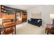 Inviting living room featuring custom built-in bookshelves and a cozy seating area at 4151 Deep Wood Cir, Durham, NC 27707