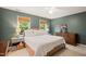 Serene bedroom with natural light, a comfortable bed, and a tranquil decor at 4151 Deep Wood Cir, Durham, NC 27707