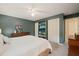 Spacious bedroom offering a bed, dresser, and ample closet space, ideal for storage at 4151 Deep Wood Cir, Durham, NC 27707