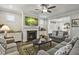 Comfortable living room showcasing fireplace, sofas, and open layout at 465 Gianna Dr, Clayton, NC 27527