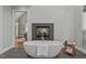 Luxurious bathroom featuring a soaking tub, fireplace, and elegant fixtures, creating a spa-like retreat at 4905 Ivercroft Pl, Fuquay Varina, NC 27526