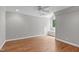 Spacious bedroom featuring hardwood floors, a ceiling fan and a window seat at 4905 Ivercroft Pl, Fuquay Varina, NC 27526