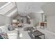 Cozy living area features skylights, ceiling fan, comfortable seating and a stylish coffee table at 4905 Ivercroft Pl, Fuquay Varina, NC 27526