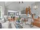 Spacious living room with a view of the dining room and staircase at 4905 Ivercroft Pl, Fuquay Varina, NC 27526