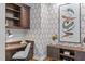 Elegant office details with custom wood finishes, built-ins, and stylish decor creating a refined workspace at 4905 Ivercroft Pl, Fuquay Varina, NC 27526