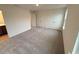 Spacious bedroom with plush carpet and double closets at 507 Eastwood St, Durham, NC 27704