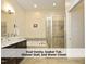 Elegant bathroom with dual vanity, soaker tub, and walk-in glass shower at 511 Hillsborough St # Bldg B 106, Chapel Hill, NC 27514