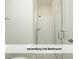 Bright secondary bathroom featuring white subway tile and a glass shower door at 511 Hillsborough St # Bldg B 106, Chapel Hill, NC 27514