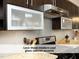 Modern kitchen with glass cabinet accents above the stove at 511 Hillsborough St # Bldg B 106, Chapel Hill, NC 27514