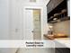 Convenient pocket door leading to a well-organized laundry room at 511 Hillsborough St # Bldg B 106, Chapel Hill, NC 27514