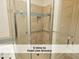 Modern glass enclosed shower with built-in niche and chrome fixtures at 511 Hillsborough St # Bldg B 106, Chapel Hill, NC 27514