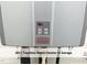 Close up of the 2023 tankless water heater in garage at 511 Hillsborough St # Bldg B 106, Chapel Hill, NC 27514