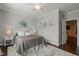 Inviting bedroom with soft carpet, neutral colors, and classic furniture at 521 Morning Oaks Dr, Holly Springs, NC 27540