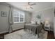 Cozy bedroom features a comfy bed, stylish decor, and natural light at 521 Morning Oaks Dr, Holly Springs, NC 27540