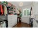 Custom walk-in closet with ample storage space and modern lighting at 521 Morning Oaks Dr, Holly Springs, NC 27540