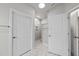 Bathroom featuring a walk-in shower with marble walls and tile flooring, with an abundance of natural light at 537 Bramble Ln, Clayton, NC 27527