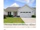 Charming one-story home with a well-manicured lawn and an attached two-car garage at 537 Bramble Ln, Clayton, NC 27527