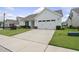 Attractive one-story house with neat landscaping and an attached two-car garage at 537 Bramble Ln, Clayton, NC 27527