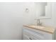 Bright bathroom vanity featuring stone countertops, undermount sink and updated faucet at 5429 Fortunes Ridge Dr, Durham, NC 27713