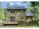 Back exterior of home with deck and fenced yard at 5429 Fortunes Ridge Dr, Durham, NC 27713