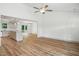 Spacious living room with hardwood floors opens to the kitchen at 5500 Lake Wendell Rd, Zebulon, NC 27597
