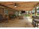 Outdoor patio with an outdoor kitchen area is perfect for relaxation in the home at 5593 Leon Rd, Nashville, NC 27856