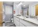 Stylish bathroom features double sinks with marble countertops and tile floors at 5593 Leon Rd, Nashville, NC 27856