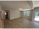 Open concept living room with outdoor access and natural light at 57 Blanton Ct, Lillington, NC 27546