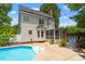 Charming backyard with a beautiful pool and a screened porch, ideal for outdoor living at 5833 Dahlberg Dr, Raleigh, NC 27603