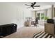Versatile room features a desk area and a cozy space for relaxation, perfect for a home office or bedroom at 5833 Dahlberg Dr, Raleigh, NC 27603