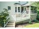 Lovely deck with white railing and steps, perfect for outdoor relaxation at 6205 Remington Lake Dr, Raleigh, NC 27616