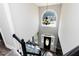 Bright foyer features a chandelier hanging above the front door with decorative glass at 6205 Remington Lake Dr, Raleigh, NC 27616