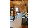 Unfinished attic space with wooden beams and open studs providing ample storage at 642 Collington Dr, Mebane, NC 27302