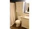Bathroom featuring white cabinets, subway tile backsplash, and a neutral-toned vanity top at 642 Collington Dr, Mebane, NC 27302